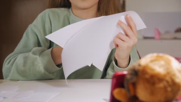 Girl Cuts Paper - Footage, Video