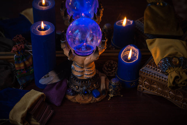 Candle burns on the altar, magic among candles, clean energy, magical concept - Photo, Image