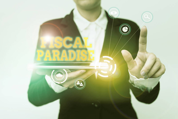 Inspiration showing sign Fiscal Paradise. Concept meaning The waste of public money is a great concern topic Woman In Suit Holding Tablet Pointing Finger On Futuristic Virtual Button. - Photo, Image