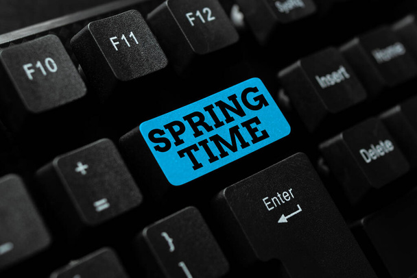 Writing displaying text Spring Time. Business idea temperate season of the year identified by a revival of plants Abstract Office Typing Jobs, Typewriting Important Work Reports - Foto, Imagem
