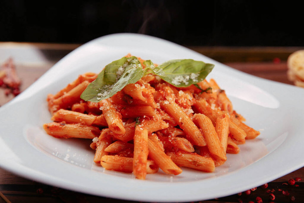 Tasty appetizing classic Italian pasta with a delicious sauce. - Foto, afbeelding