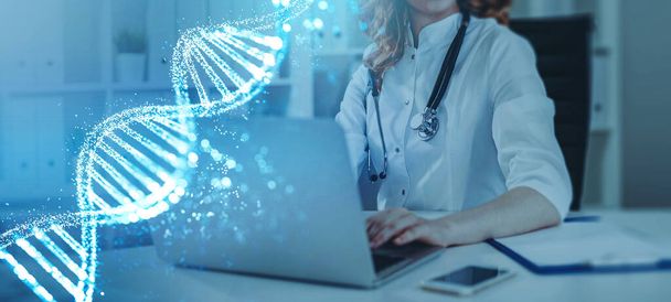 Woman doctor with laptop and notes, laboratory. DNA structure and cells, bokeh lights. Concept of biology and science, genetic material. Medicine and innovation - Fotoğraf, Görsel