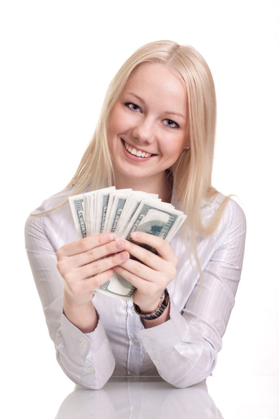 Portrait of a happy woman with a fan of American dollar currency - Фото, изображение