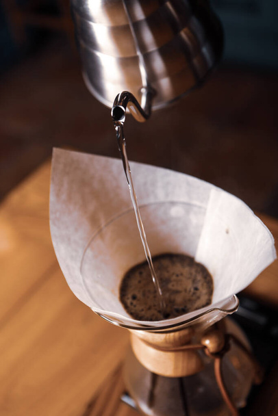 barista brewing coffee in the coffee room - Foto, imagen
