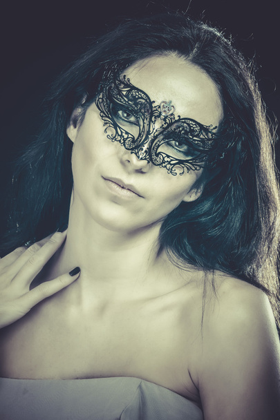 Femme avec masque vénitien
 - Photo, image