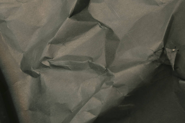 black creased crumpled paper background grunge texture backdrop - Valokuva, kuva