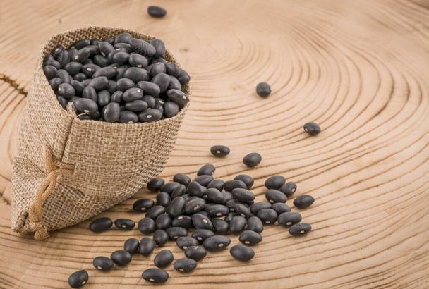 Food background of healthy dried black bean - Foto, Imagem