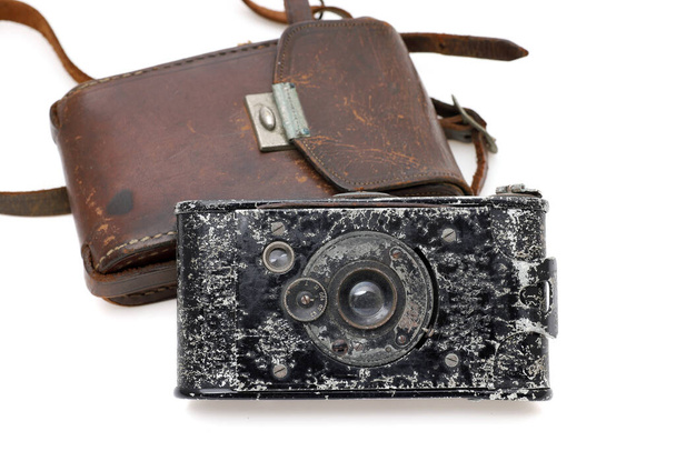 Old bellows film camera isolated on a white background  - Фото, изображение