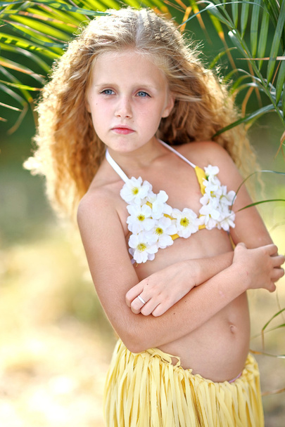 portrait of little girl in tropical style - Zdjęcie, obraz