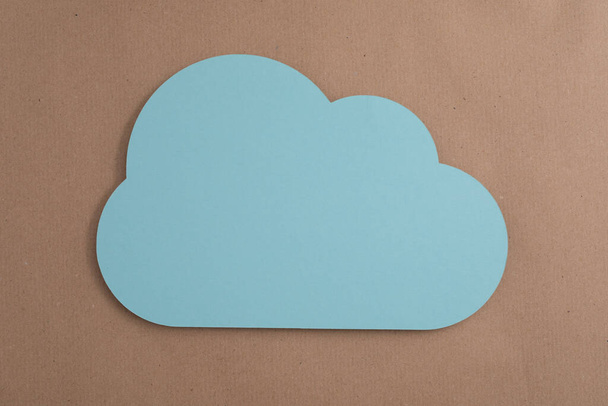 A top view of a papercut cloud - Foto, Bild