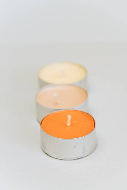 A closeup of decorative candles on a white background - Photo, Image