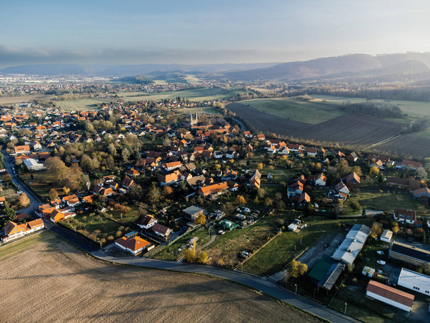 A drone shot of the Ilsenburg district in Druebeck, Harz, Saxony-Anhalt, Germany - Fotoğraf, Görsel