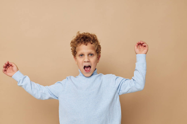 curly boy childrens style fashion emotions isolated background - Фото, изображение