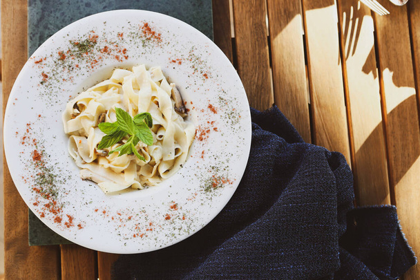 Tasty appetizing classic Italian pasta with a delicious sauce. - Zdjęcie, obraz