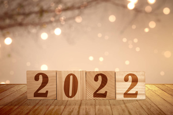 2022 on the wooden cube. Happy New Year 2022 - Foto, Imagen
