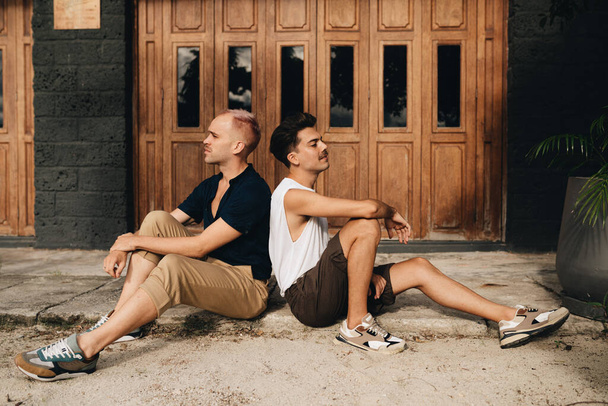 Gay Couple spend time together outdoors. Homosexual couple having fun together - Photo, Image
