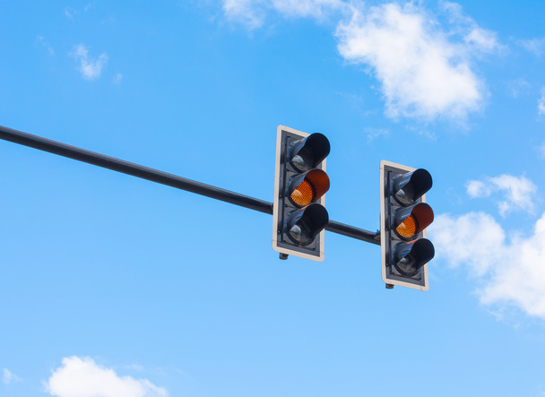 Image of traffic light, the amber light is lit. symbolic  for wa - Foto, immagini
