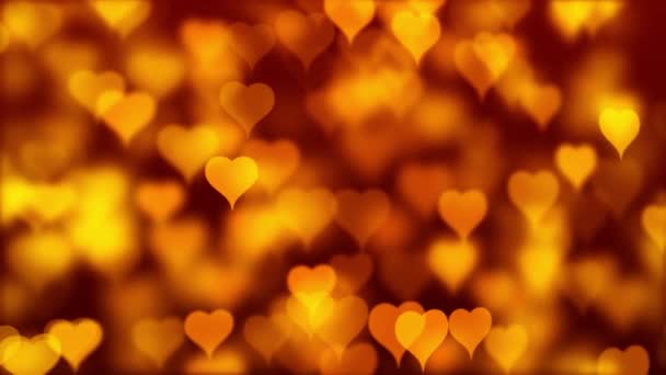 Heart particle animated background video. Yellow love hearts bokeh sparkle glitter particle motion Loop background. Festive of bokeh, sparkles, hearts for Valentine's day, birthday. - Záběry, video