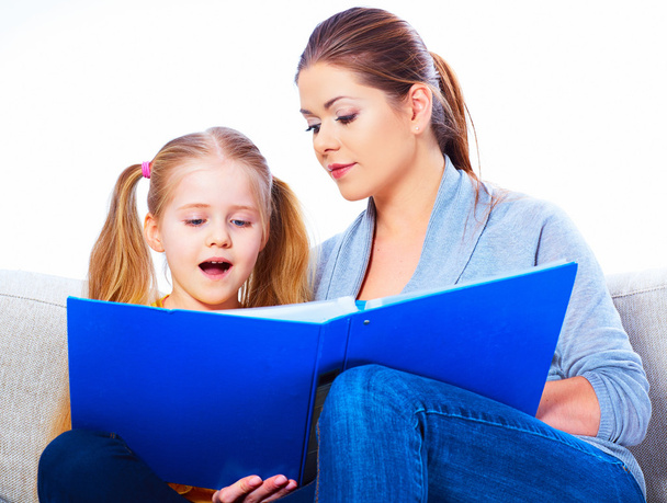Mother reading book with daughter - Fotografie, Obrázek