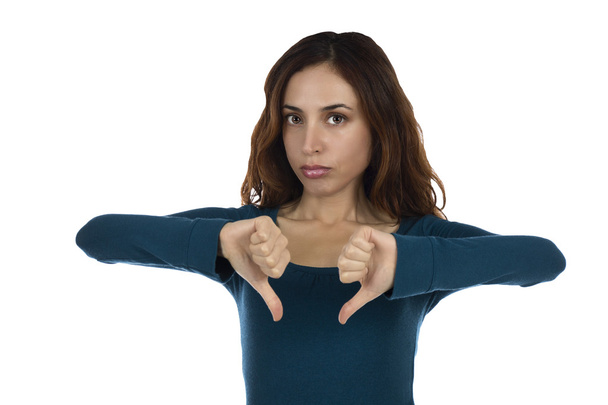 Женщина показывает свое неодобрение с опущенными пальцами
 - Фото, изображение