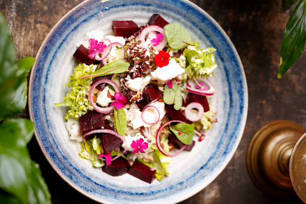 Beetroot salad. Jewish kosher dish.Healthy, dietary green salad.Culinary photography. Suggestion to serve the dish. - Фото, зображення