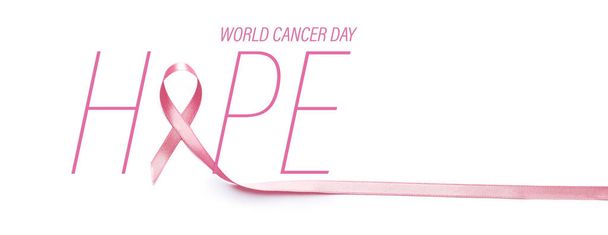 Word HOPE with awareness ribbon on white background. World Cancer Day - Foto, immagini
