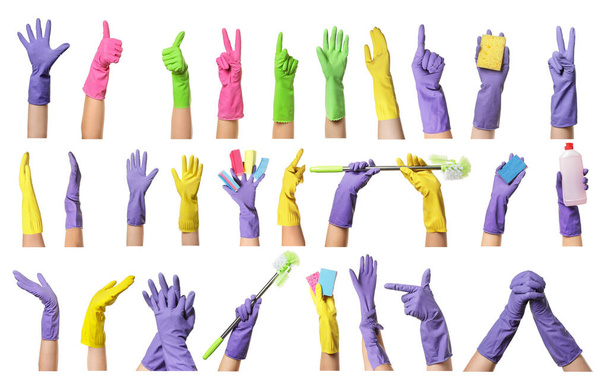 Χέρια σε λαστιχένια γάντια και με προμήθειες καθαρισμού σε λευκό φόντο - Φωτογραφία, εικόνα
