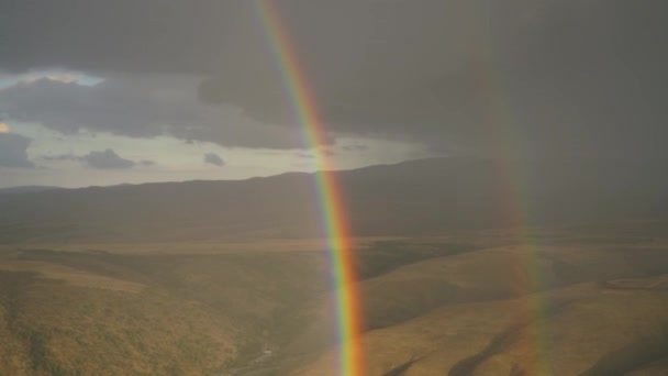 8K 7680X4320 4320p.Rainbow after stormy rain and dust cloud.Before a heavy and heavy downpour.Continental terrestrial climate.Treeless barren steppe hills.Afternoon evening time lapse nature weather. - Footage, Video