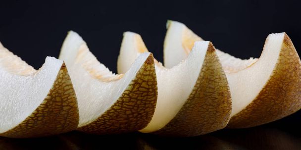 A row of ripe juicy melon lobes. - Valokuva, kuva