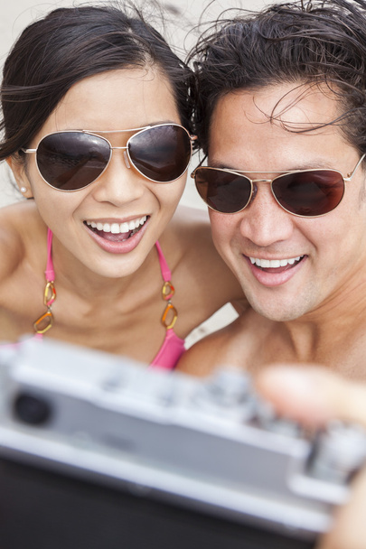 Asian Couple at Beach Taking Selfie Photograph - Photo, Image