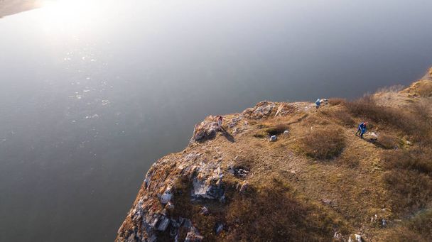 Drone view for cliffs above the river. Fall landscape birds eye view. Autumn scenic nature. - Foto, afbeelding