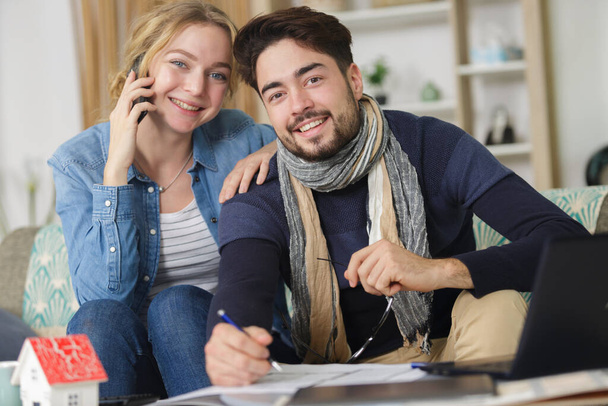 young couple planning to buy new house - Foto, Imagen