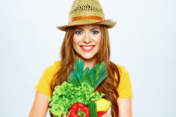 Woman holding paper bag with vegan food - Fotografie, Obrázek