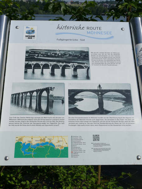 Explanation board for the footbridge over the Moehne Lake, Sauerland, North Rhine-Westphalia, Germany - Zdjęcie, obraz