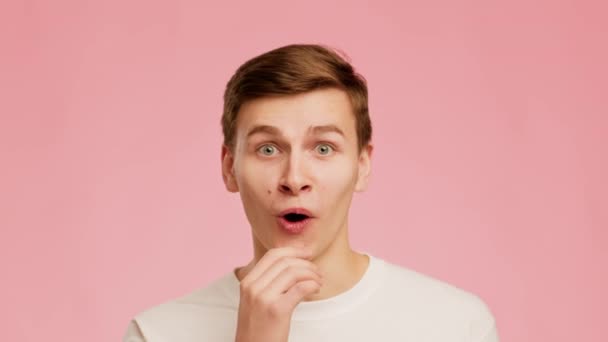 Man Thinking Having Idea Pointing Finger Up Posing, Pink Background - Video