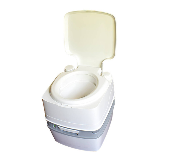 Portable plastic toilet isolated on white background. - 写真・画像
