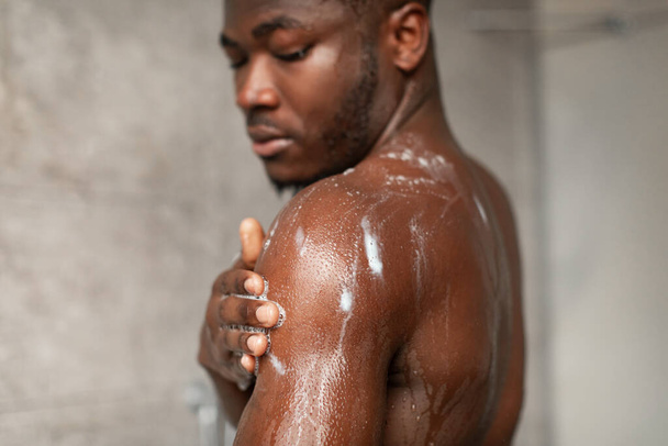 Muscular African American Man Washing Body Taking Shower Indoors - Foto, Imagem