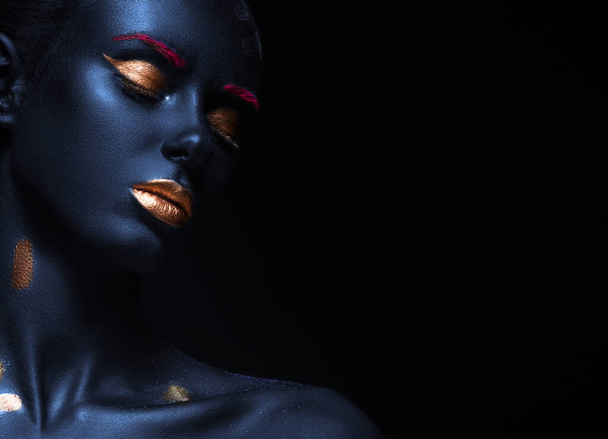 fashion portrait of a blue-skinned girl with color make-up. Beauty face. - Photo, image