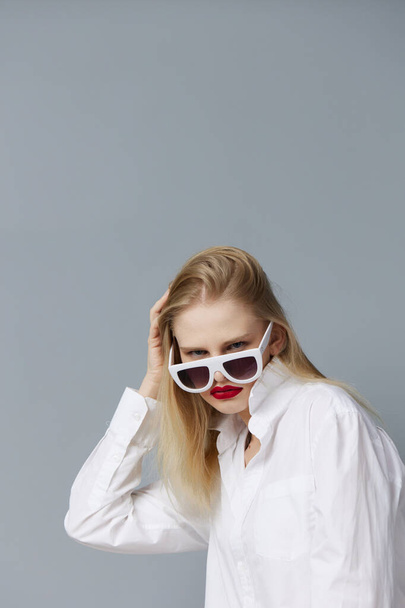 blonde woman red lips fashion glasses studio model unaltered - Fotó, kép