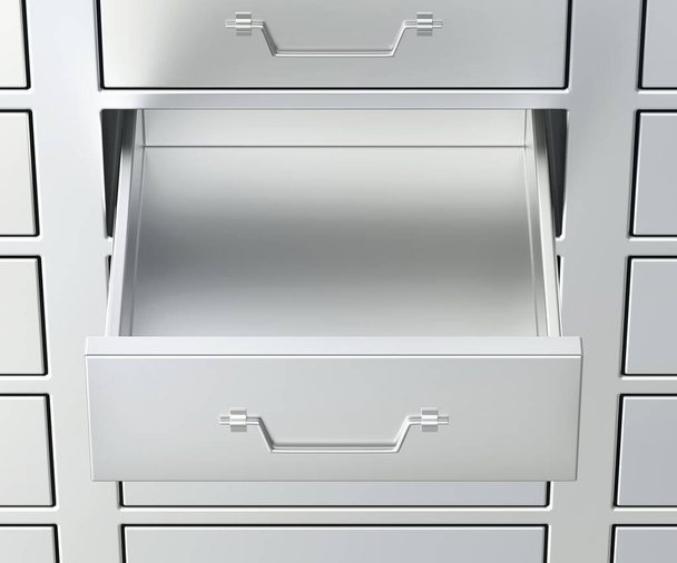 File cabinet with an open drawer, empty inside - Фото, изображение