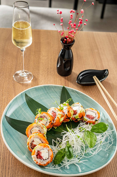 sushi and  white wine in restaurant - Fotografie, Obrázek