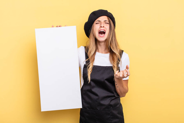 woman artist looking desperate, frustrated and stressed empty canvas concept - 写真・画像