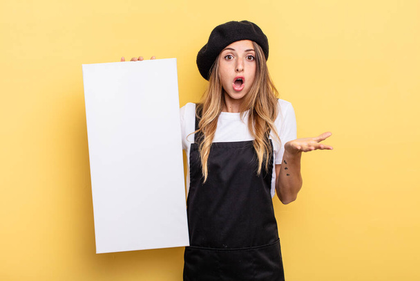 woman artist feeling extremely shocked and surprised empty canvas concept - Foto, imagen