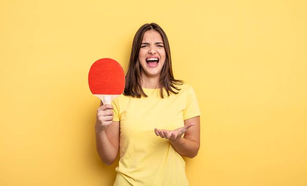 pretty woman looking desperate, frustrated and stressed. ping pong concept - Foto, imagen
