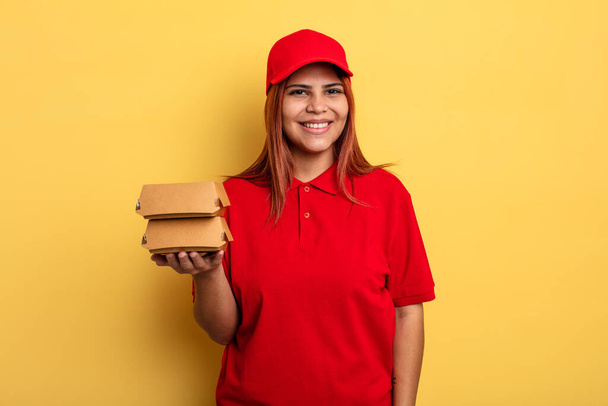 hispanic woman looking happy and pleasantly surprised. take away deliver concept - Fotografie, Obrázek
