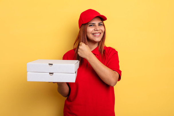 hispanic woman feeling happy and facing a challenge or celebrating. take away deliver concept - Fotoğraf, Görsel