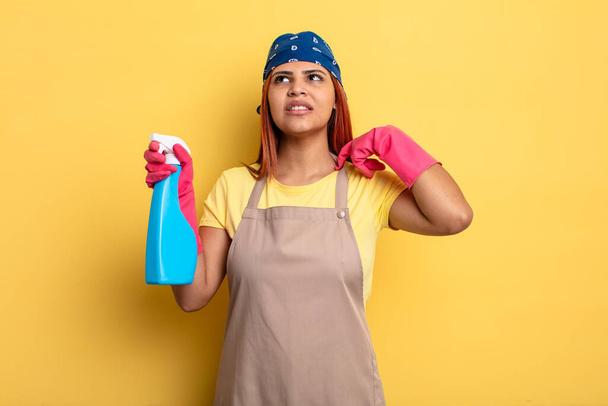 hispanic woman feeling stressed, anxious, tired and frustrated. cleaning and housekeeper concept - Zdjęcie, obraz