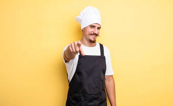 chef man pointing at camera choosing you - Foto, afbeelding