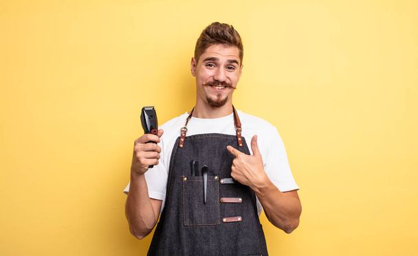 hipster barber man feeling happy and pointing to self with an excited - 写真・画像