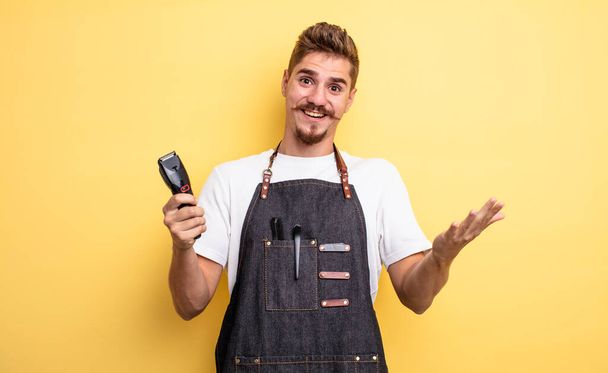 hipster barber man feeling extremely shocked and surprised - Photo, image